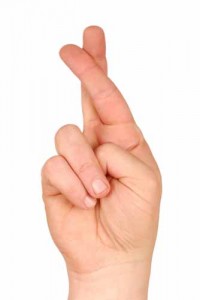 Crossed fingers.